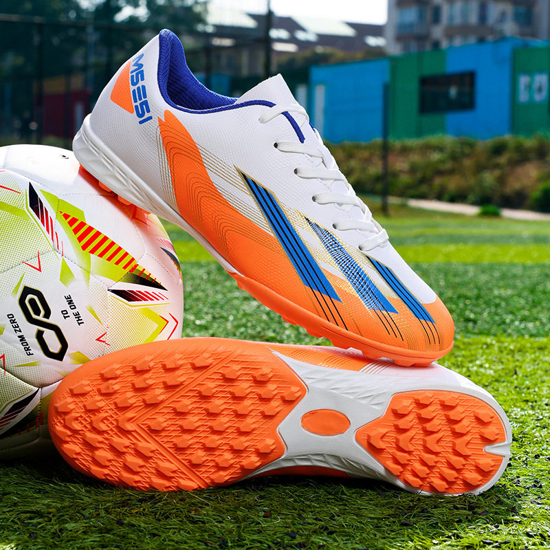 新款足球鞋男女长钉碎钉比赛青少年中小学生儿童专业训练鞋