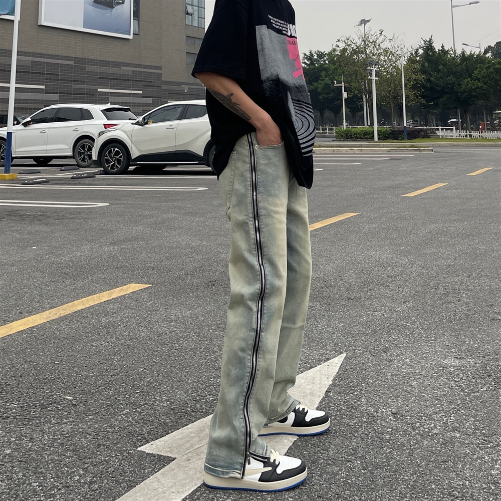 高街浅色水洗做旧黄泥拉链牛仔裤