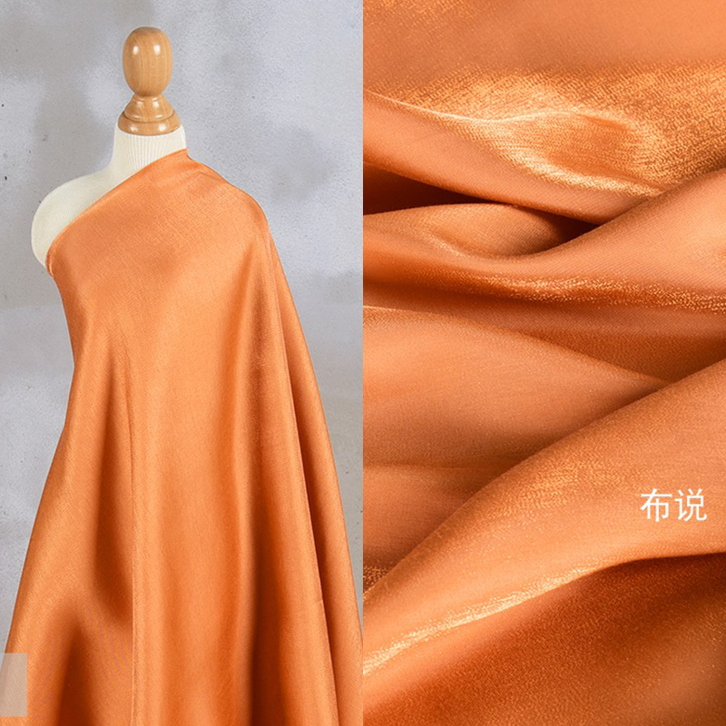 桔色亮光琉璃幻彩缎衬衫面料彩色水晶人鱼姬镭射汉服金银丝布