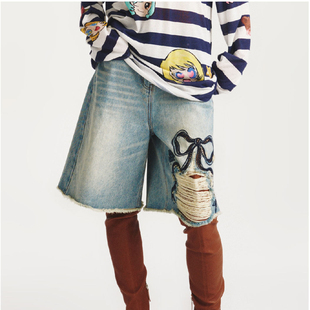 商场同款2026年春季牛仔风破洞短裤女休闲百搭蝴蝶结刺绣毛边裤子