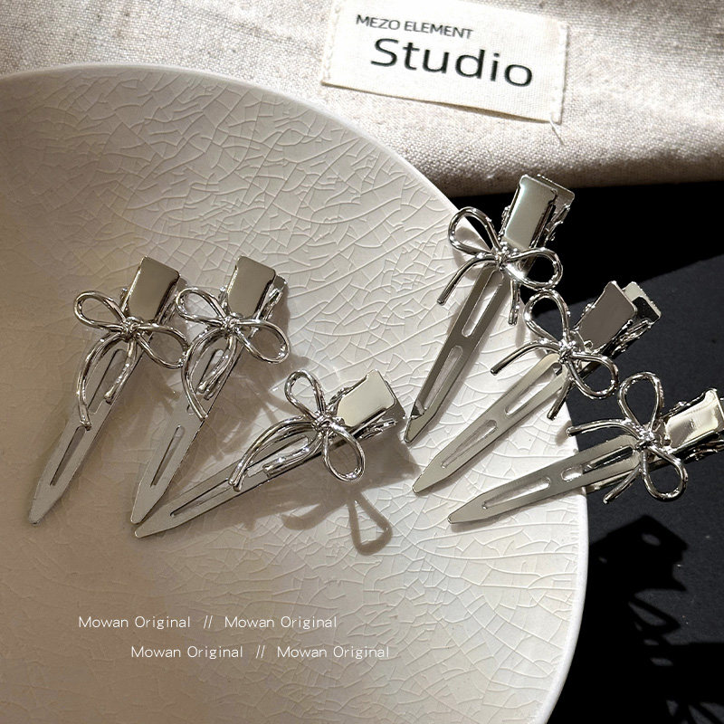 甜酷金属蝴蝶结侧边发夹