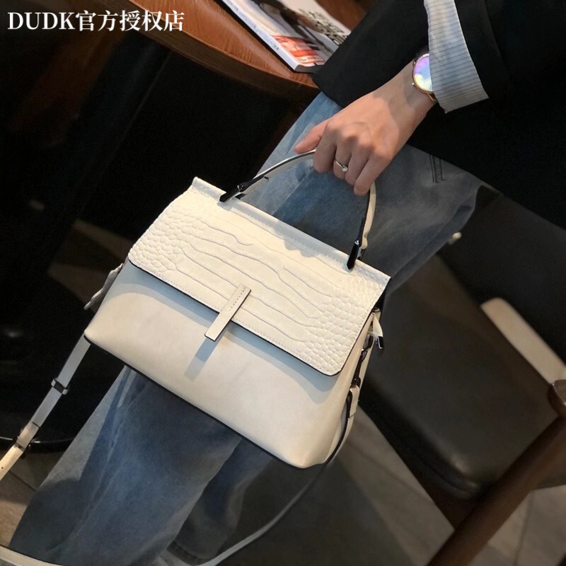 法国DUDK女士包包2026新款潮时尚斜挎包大气真皮气质女包手提包
