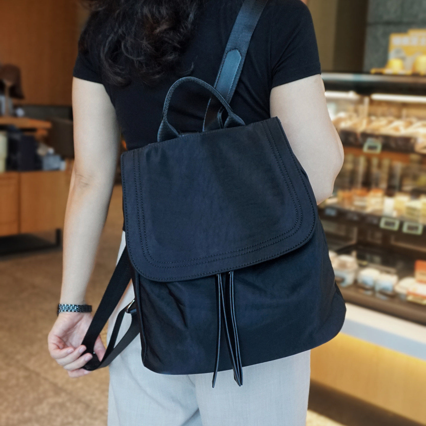法国ZAMP新帽檐双肩包女小众轻便牛津防水布背包中号通勤背包女包