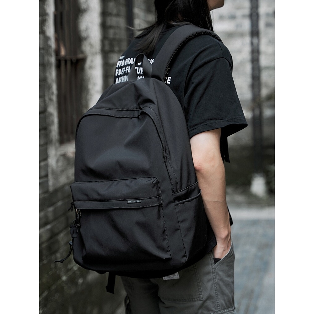 法国ITonick.书包学生轻便双肩包多功能潮流电脑背包简约旅行包男