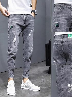 夏季破洞黑色弹力牛仔裤男士潮牌春秋款潮流修身小脚休闲九分裤子
