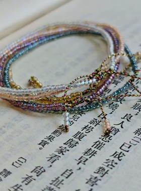 超细2mm进口幻彩琉璃米珠手链 纯手工编绳可调节抽绳款手链