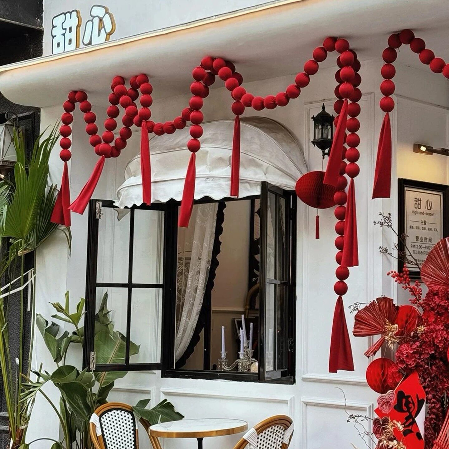 新年装饰商场门头布艺圆球串挂件橱窗节日氛围感布置拍照打卡道具