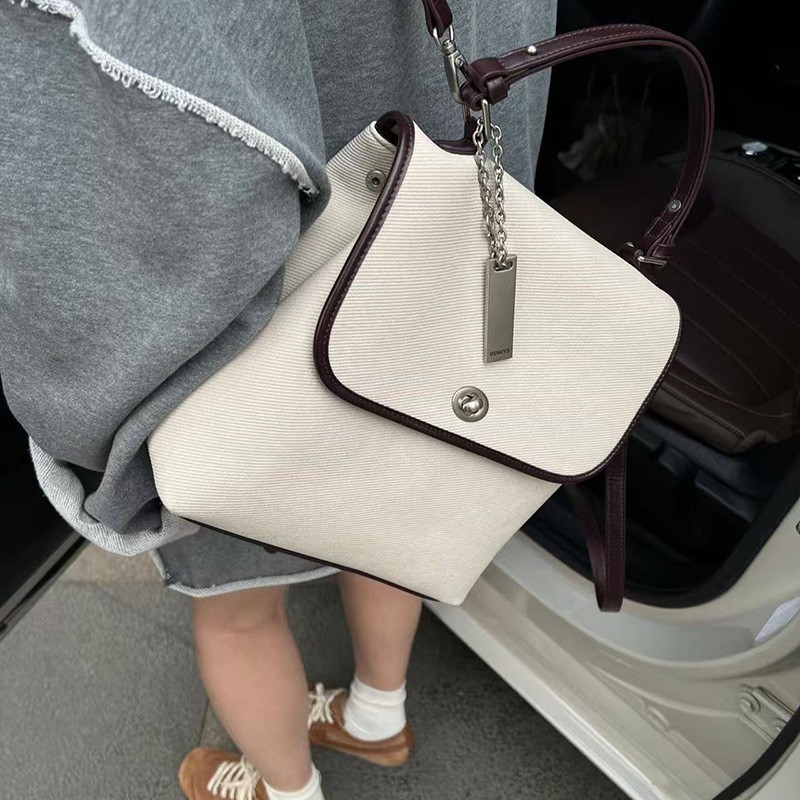 时尚简约精致背包女潮流百搭撞色背包高级感简约休闲手提包双肩包