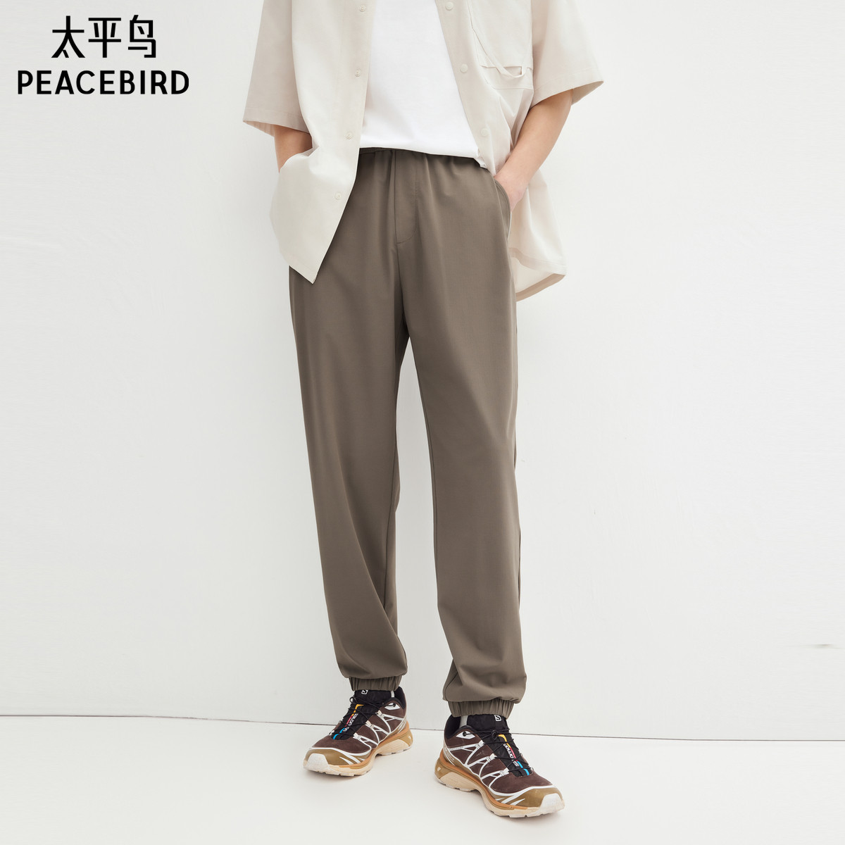 【四面弹】太平鸟男装 休闲裤男纯色抽绳潮流松紧腰束脚锥形裤男
