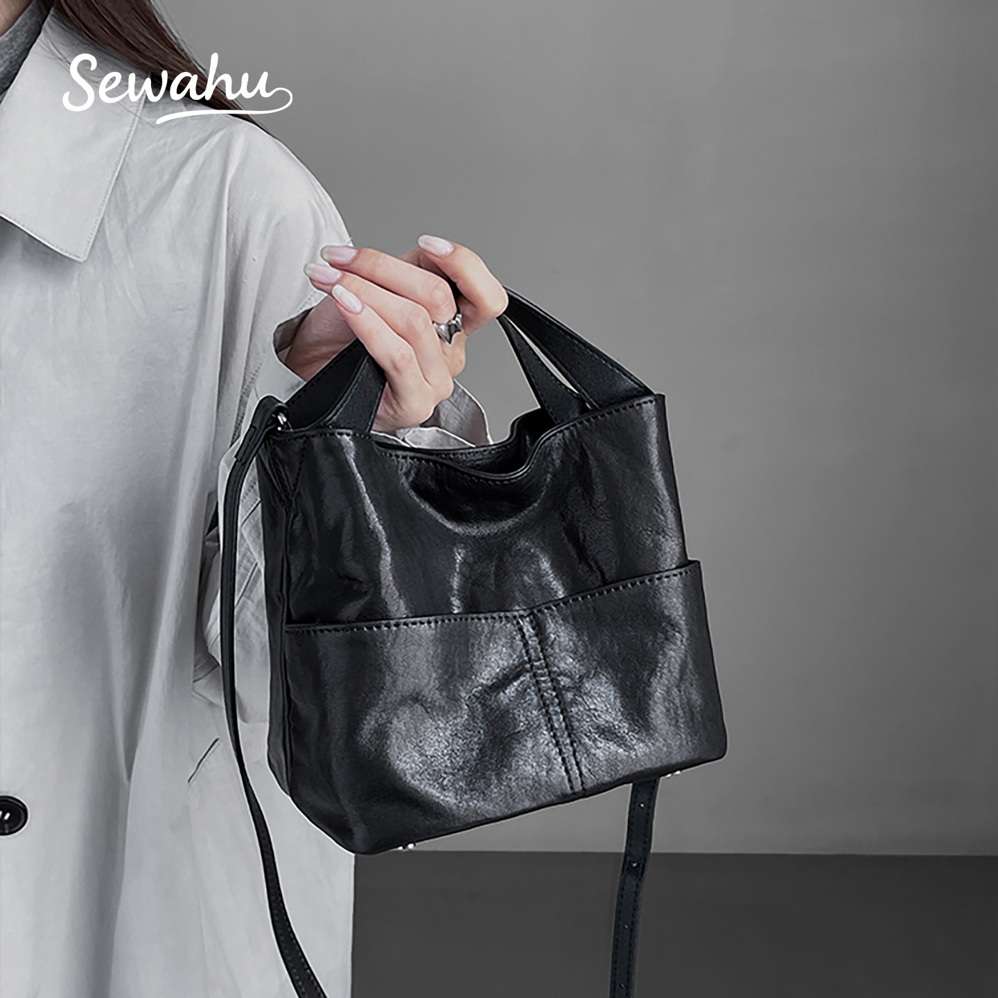 高级感牛皮水桶包2026春夏新款女包简约质感通勤手提单肩包斜挎包