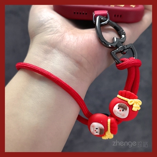 新年红可爱萌娃手机挂绳ins手腕式短款编织手绳结实耐用可调节锁扣男女户外出行旅游逛街防丢手机壳小吊绳