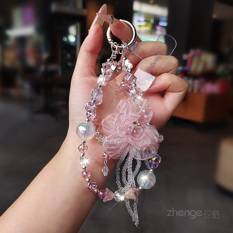 精致高级感手机链网纱水晶挂件女手腕饰品ins小众手工串珠短款户外旅游逛街防丢手提链带子手机壳挂绳新品