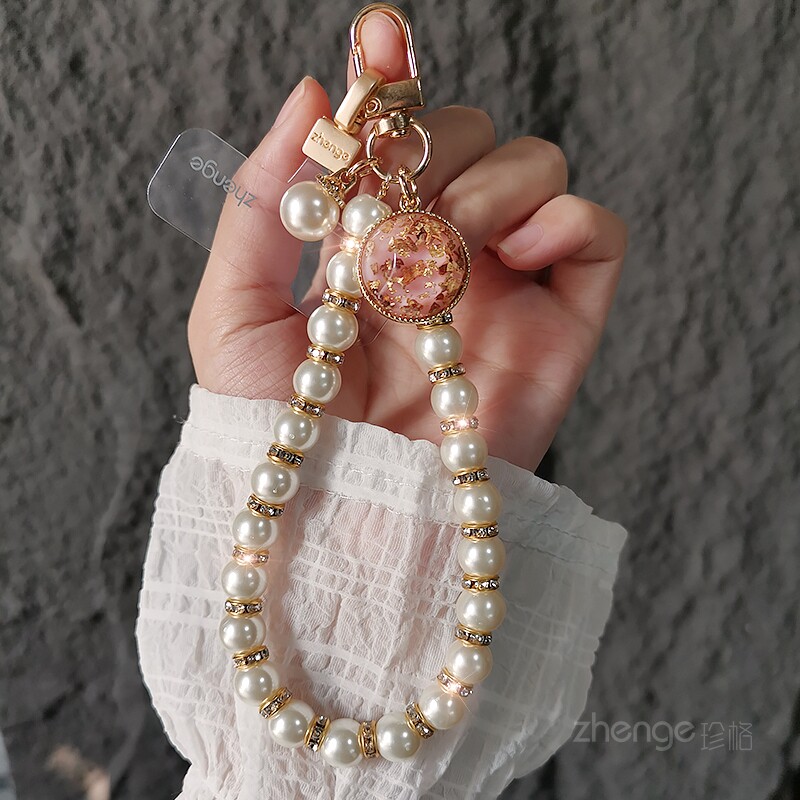 新款珍珠手机链女时尚高档挂件