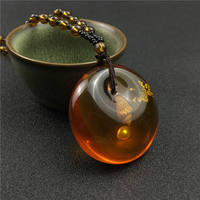 Personalized and fashionable amber imitation pendant necklace, elegant couple, versatile sweater chain, simple and trendy pendant for Internet celebrities thumbnail 4