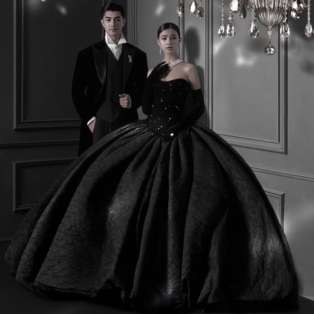 新款影楼主题服装情侣写真拍照礼服韩版室内摄影复古黑色拖尾婚纱
