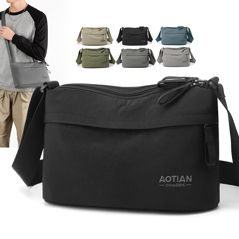 韩版新款休闲包包男女同款单肩斜挎包简约时尚多隔层牛津布包百搭