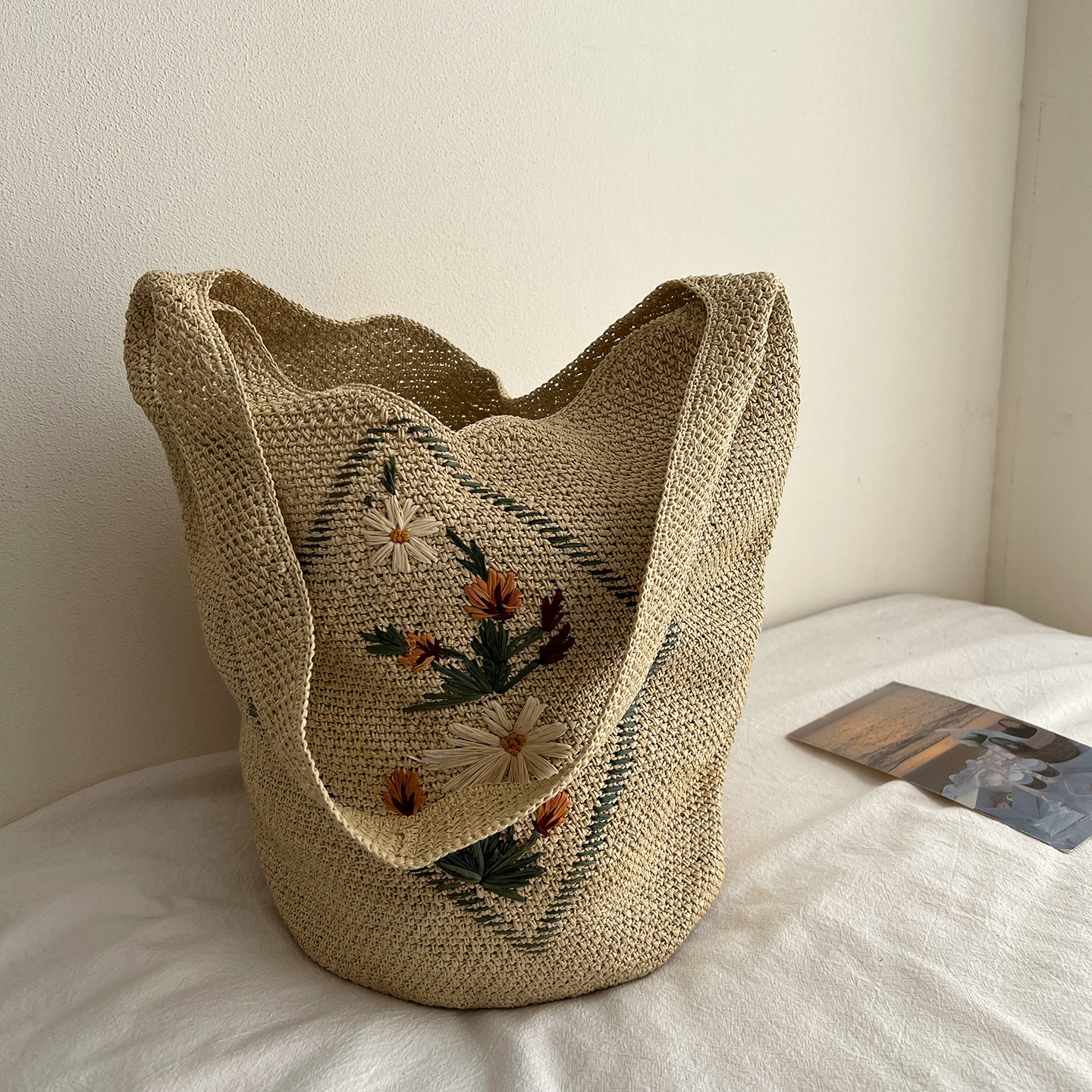 南法之夏手工钩花单肩水桶包大容量托特包百搭休闲度假风草编包女