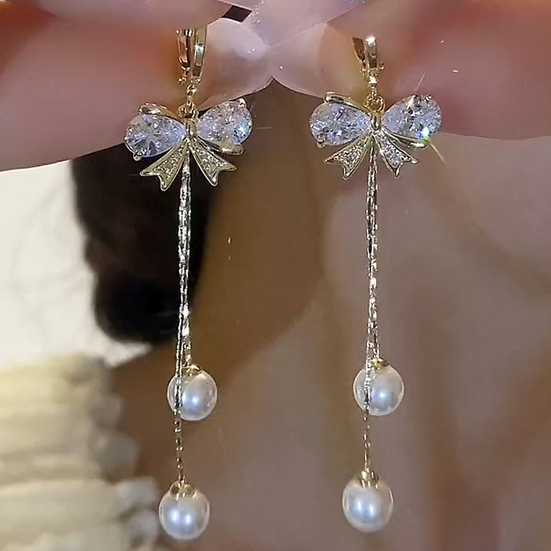 2025年新款蝴蝶结锆石珍珠流苏耳环法式耳扣气质网红长款百搭耳饰
