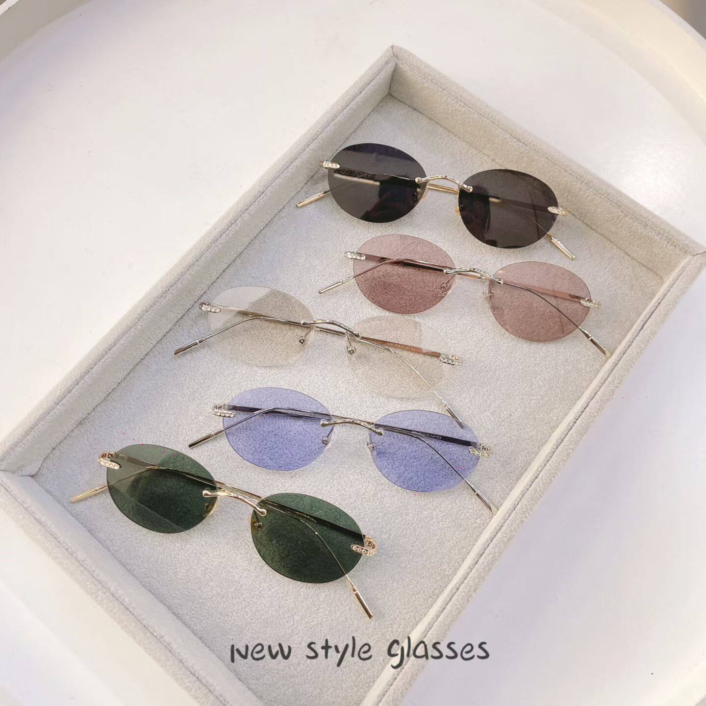 2026新款无框椭圆太阳眼镜男女蓝色粉色小众圆形时尚墨镜防紫外线