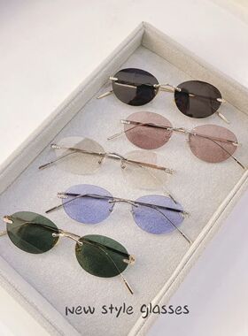 2026新款无框椭圆太阳眼镜男女蓝色粉色小众圆形时尚墨镜防紫外线