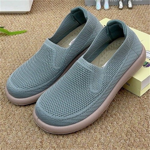 早春新款一脚蹬飞织透气妈妈鞋