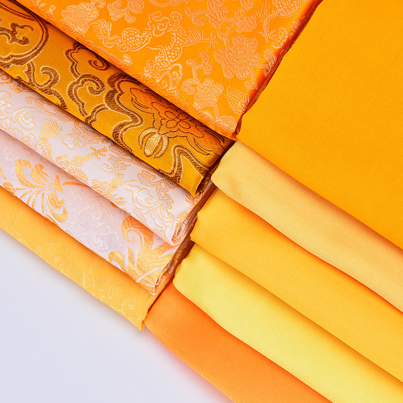 金丝黄面料礼盒内衬布里子布装饰布金丝绒布料黄布台面桌布窗帘布