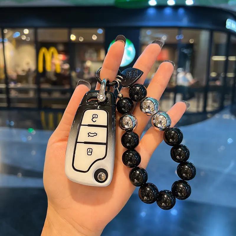 适用奥迪A3钥匙套Q2L/Q3/A1/S3/Q7/TT/A5/A7车钥匙高档保护壳女