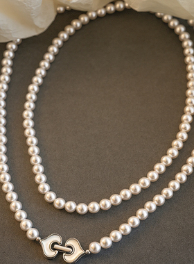 女款白色双层珍珠叠戴毛衣链