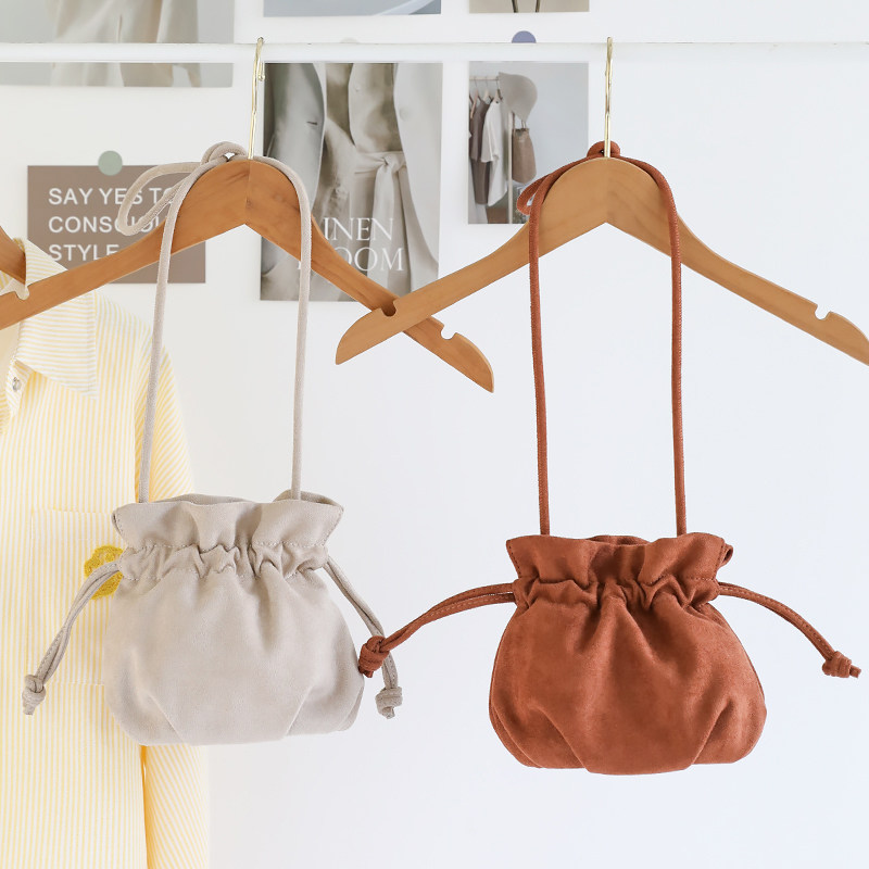 韩版可爱迷你水桶包女质感麂皮绒抽绳小包小众百搭绒面单肩斜挎包