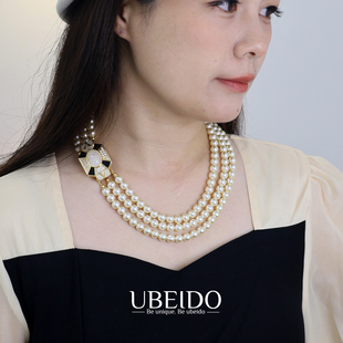 优贝朵多层长短款珍珠项链女轻奢小众设计感高级宝石水钻毛衣挂链