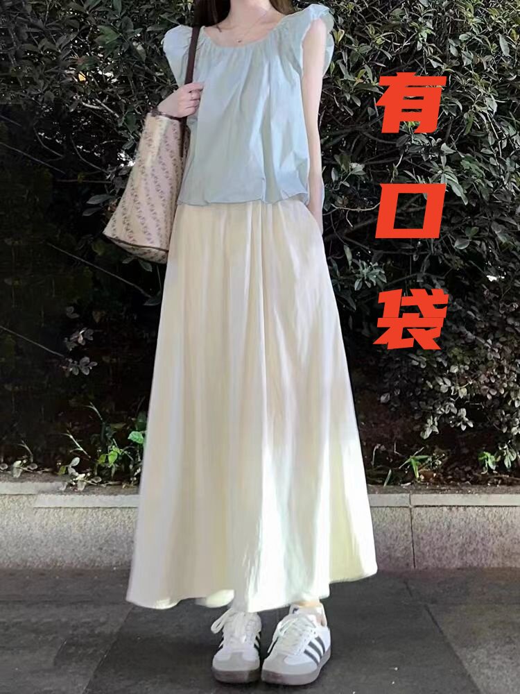 法式甜美杏色半身裙秋冬季新款气质收腰显瘦伞裙垂感a字中长裙子