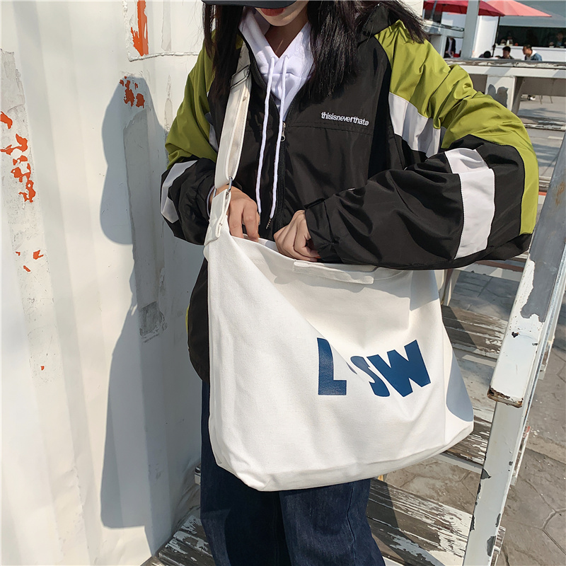 字母帆布包男慵懒风韩版大容量斜挎包ins斜肩上课包休闲单肩潮包