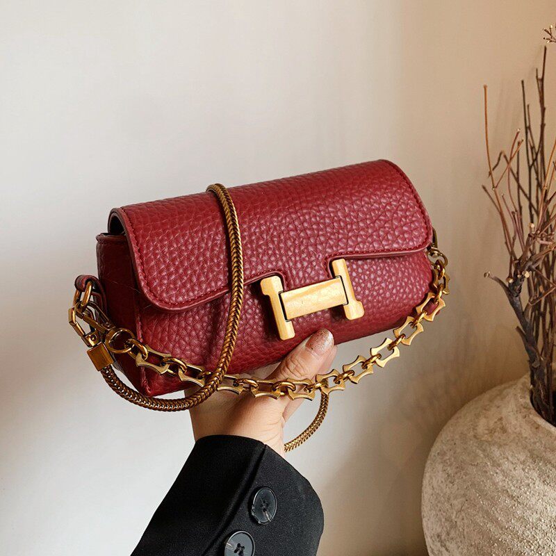 红色女士包包2026新款潮春夏时尚炼条斜挎包高级感通勤单肩小方包