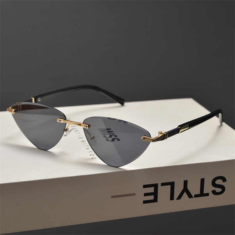 欧美复古无框切边小框猫眼墨镜男女圆脸显瘦朋克风三角形太阳眼镜