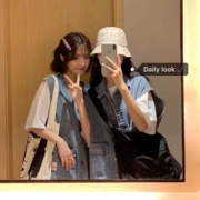 Dongdaemun ulzzang phụ nữ nguyên bản hip hop đường phố lớn bỏ túi dụng cụ denim vest lỏng áo khoác denim - Áo vest