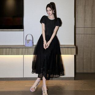黑色高级感连衣裙女2026新款夏设计感网纱拼接小个子收腰a字长裙