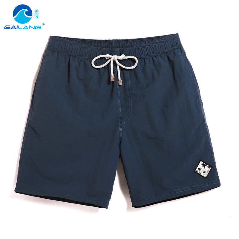 盖浪夏沙滩裤潮男素色宽松短裤