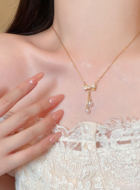 轻奢小众高级感蝴蝶结吊坠项链女甜美气质钛钢锁骨链网红同款颈链