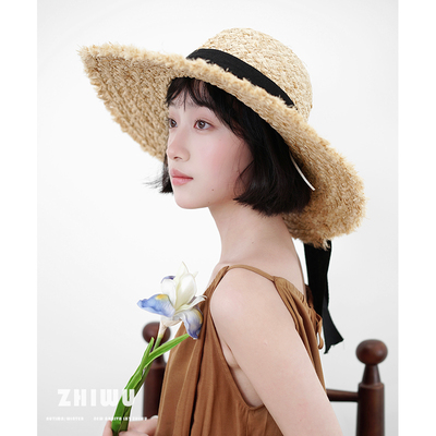 知雾夏季海边度假拉菲草帽女