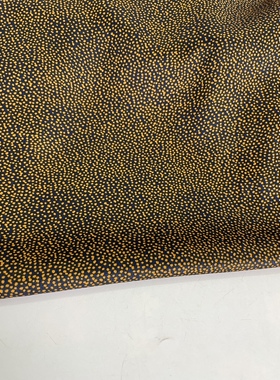 D373夏季黑底小黄点印花缎面雪纺布头 柔软透气垂感连衣裙diy面料