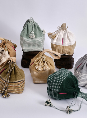 尼泊尔进口束口袋民族流苏手工编织水桶女包波wayuu西米亚度假风