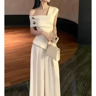 今年流行爆款套装2026新款女装夏季小众设计时尚露肩御姐上衣裤子