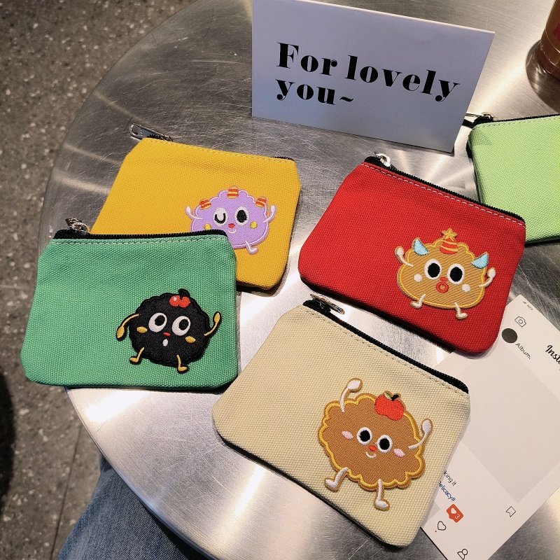 卡通可爱收纳包帆布可水洗零钱包个性手拿小包数码整理包数据线收纳袋