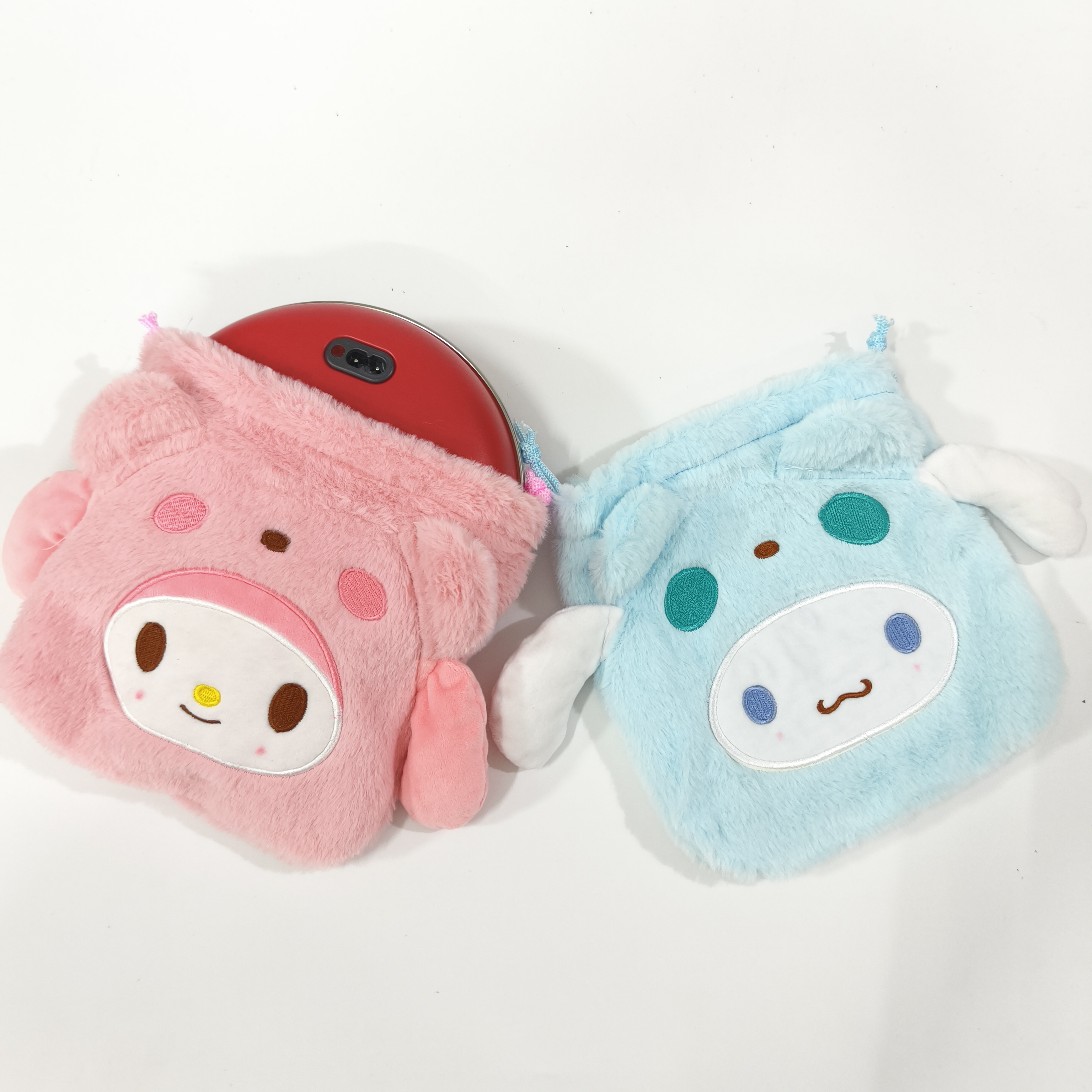 日系库洛米毛绒收纳袋美乐蒂立得相机耳机束口袋电热饼防烫保护套