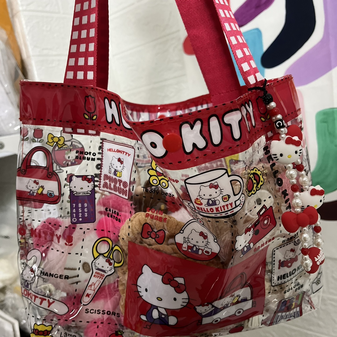 我也不想买啊可它是kitty包包耶！hellokitty pvc防水购物袋学生