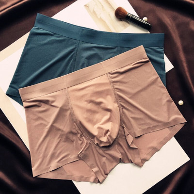 薄网眼冰丝无痕贴胶男士内裤平角