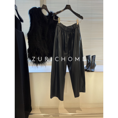 休闲庸懒优雅小羊皮弧形九分皮裤