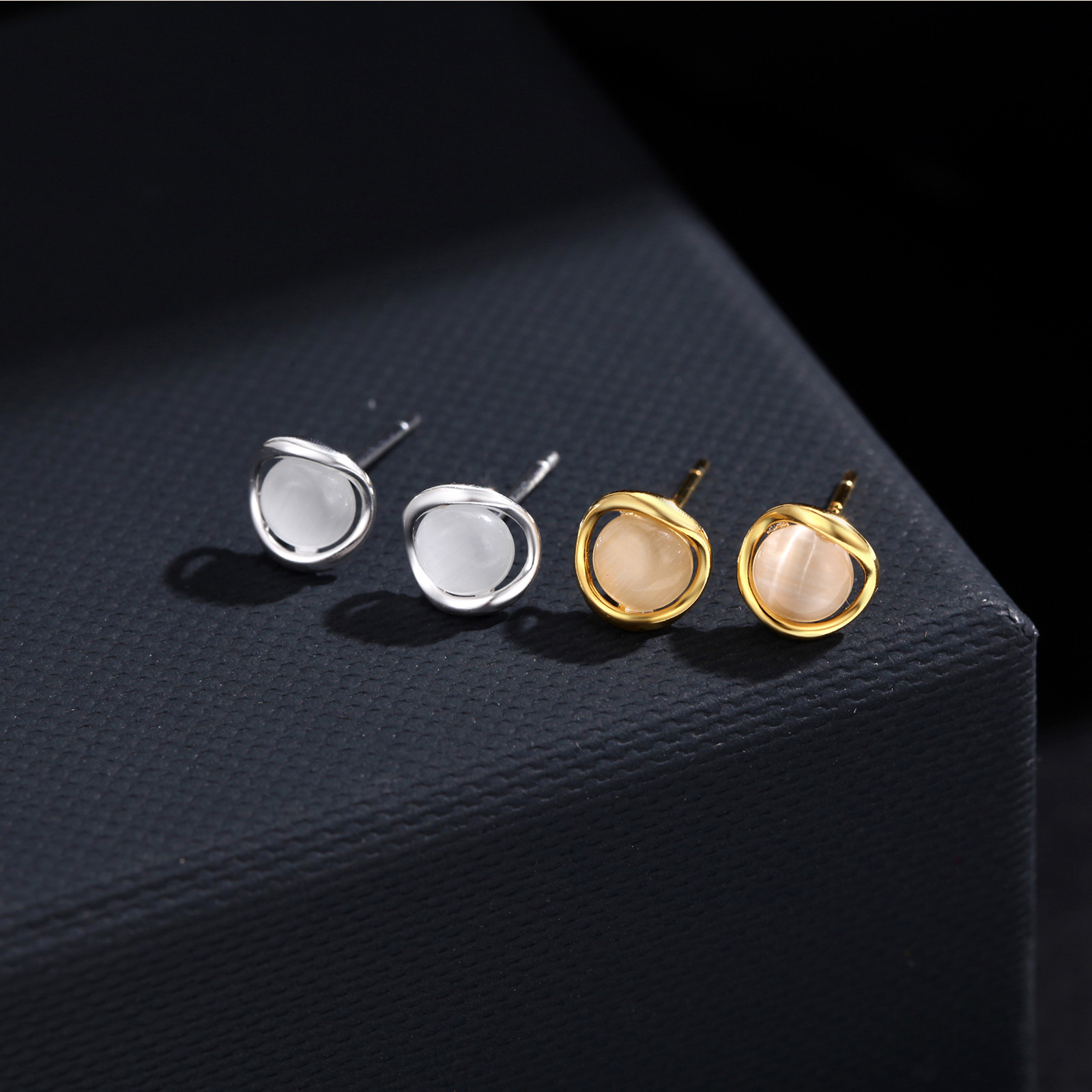 s999足银猫眼石通体纯银耳钉