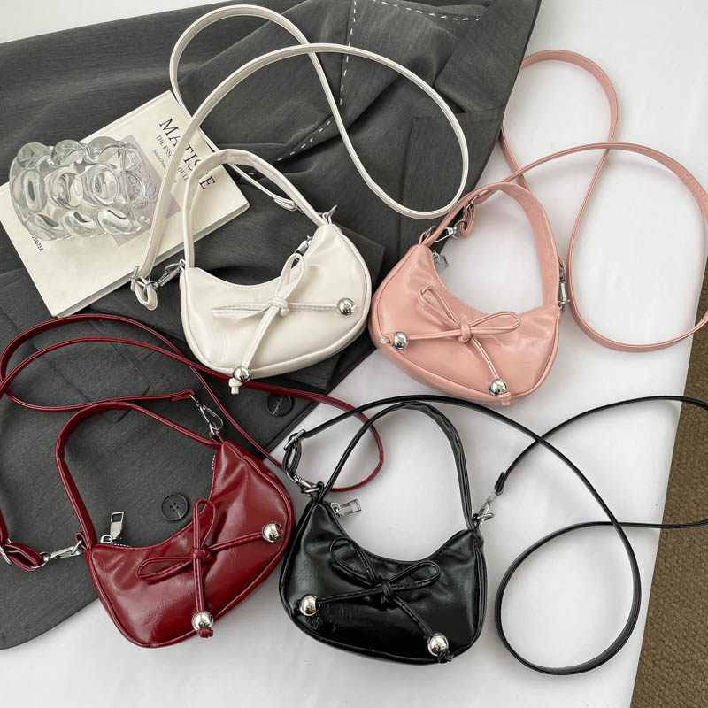 芊舒祺2026新款蝴蝶结新月形腋下包女迷你小包包日韩风斜挎包多色