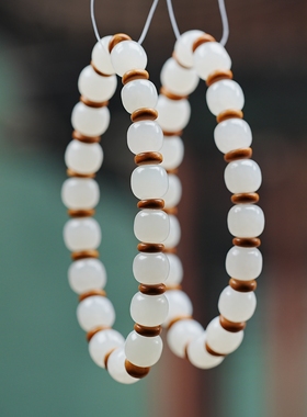 玩物养志。新疆籽料和田玉老型珠白玉8乘7设计橄榄核手链 18颗Z10